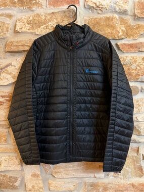 cotopaxi Men’s Black Quilted Puffer Jacket with Blue Logo